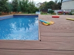 Монтаж террасной доски из ДПК Good Cover Стандарт коричневый вокруг бассейна