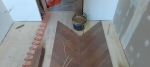 Монтаж клеевым способом инженерной доски французская ёлка Vecchio parquet на в офисе компании застройщика Кронверк